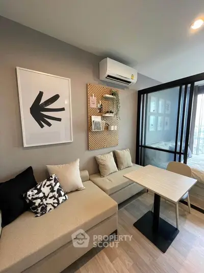 Modern living room with stylish decor and cozy seating area