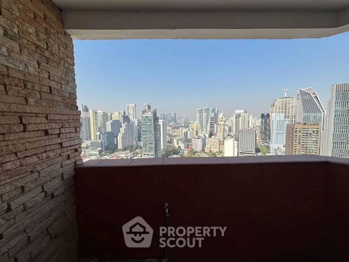 Stunning cityscape view from a high-rise balcony with modern skyline