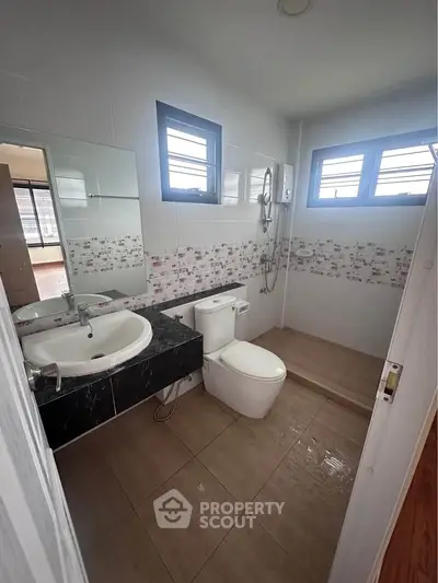 Modern bathroom with sleek fixtures and natural light