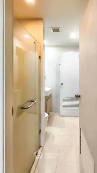 Modern bathroom with sleek design and glass shower enclosure