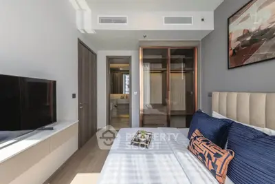 Modern bedroom with ensuite bathroom and stylish decor