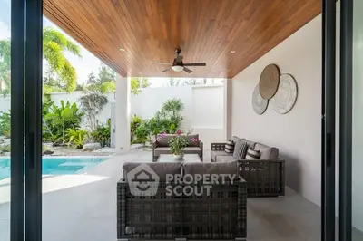 Luxurious outdoor patio with pool and stylish seating area