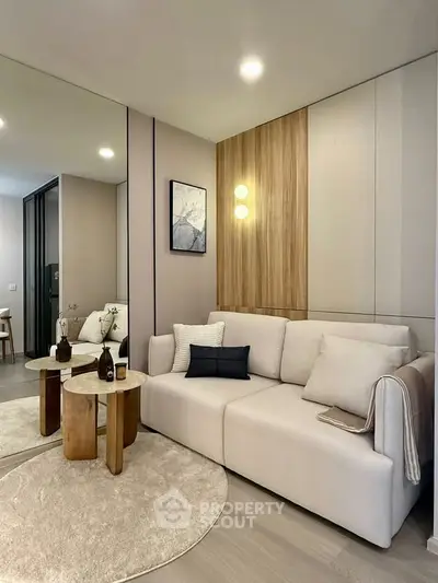 Modern living room with stylish decor and cozy seating area