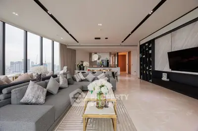 Luxurious modern living room with panoramic city views and elegant decor