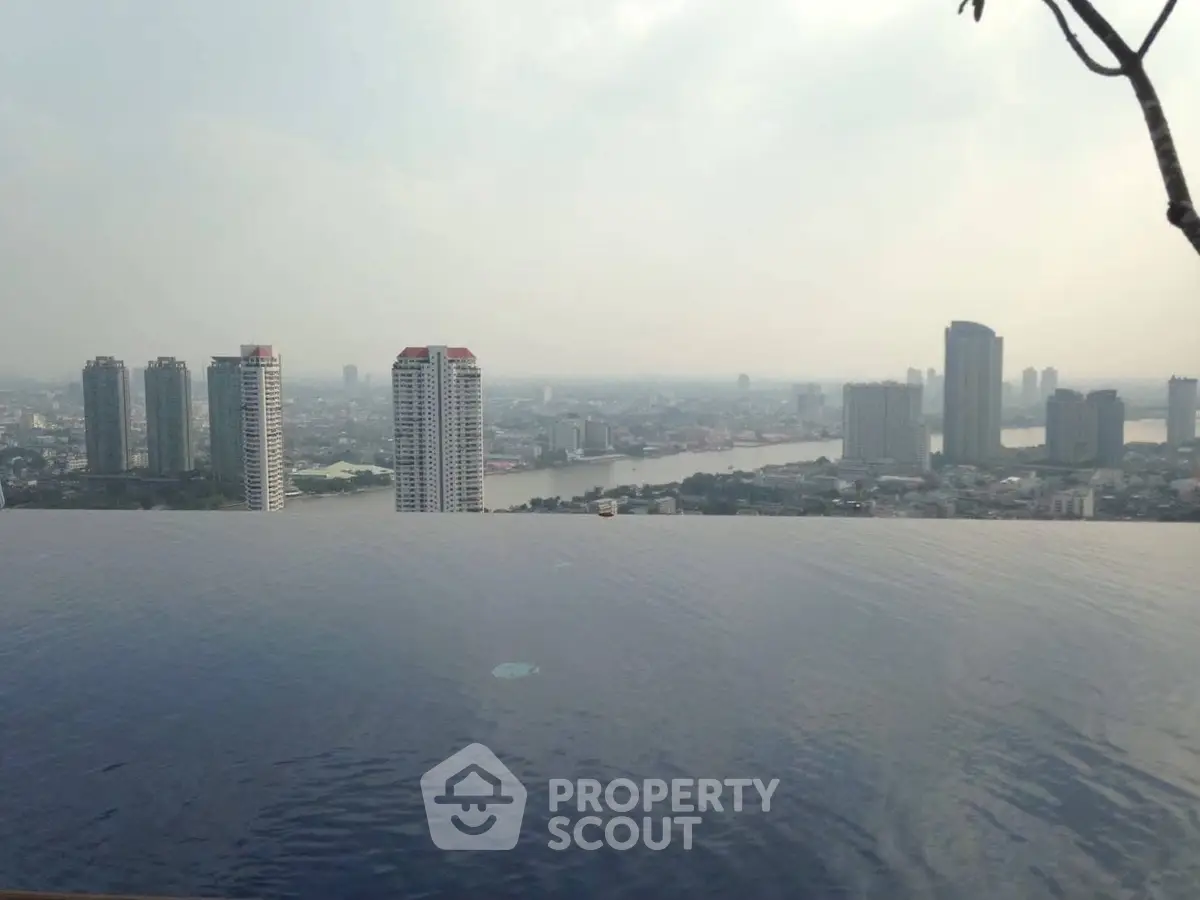 Stunning infinity pool with breathtaking city skyline view