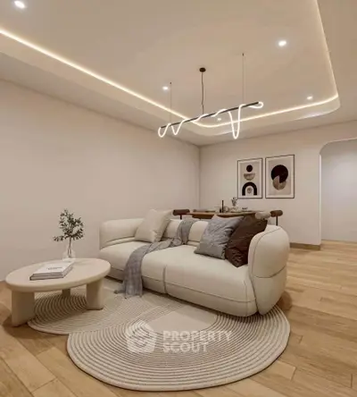 Modern living room with stylish lighting and cozy seating area