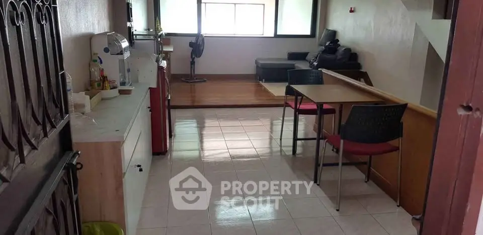 Cozy apartment interior with open layout and modern furnishings.
