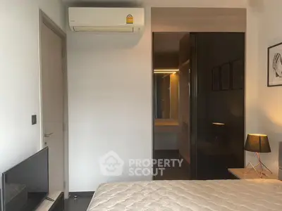 Modern bedroom with air conditioning and stylish decor