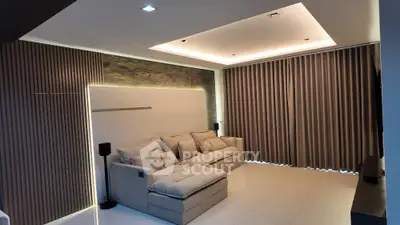 Modern living room with stylish lighting and comfortable sofa