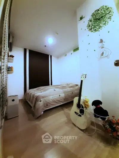 Cozy bedroom with guitar and floral decor, perfect for music lovers