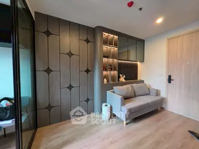 Modern living room with stylish wood paneling and cozy sofa