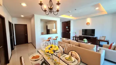 Stylish open-layout living room with modern decor and elegant dining area