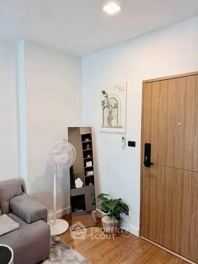 Modern living room with stylish decor and wooden flooring