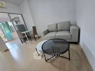 Modern living room with cozy sofa and stylish coffee table in a bright apartment