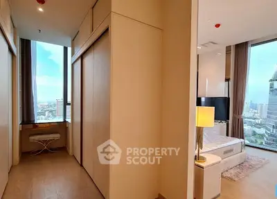 Luxurious bedroom with stunning city view and modern decor