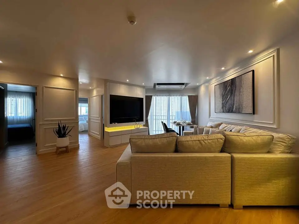 Spacious modern living room with elegant decor and natural light