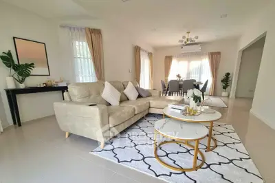 Spacious modern living room with elegant decor and natural light