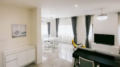 Bright and modern living room with dining area and stylish decor