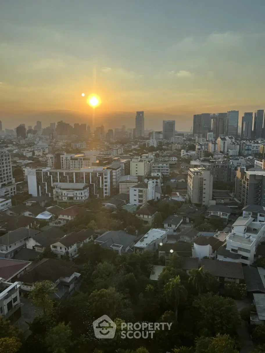 Stunning cityscape view at sunset with skyline and residential buildings