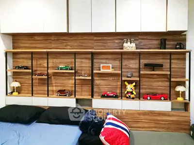 Stylish bedroom with modern wooden shelving and decorative accents