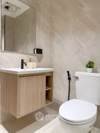 Modern bathroom with sleek fixtures and elegant tile design