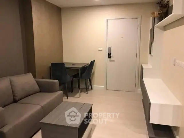 Modern living room with sleek furniture and neutral tones, perfect for urban living.