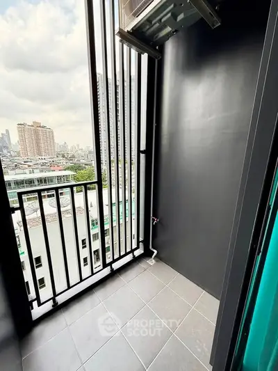 Modern balcony with city view in high-rise apartment