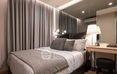 Cozy modern bedroom with elegant decor and ambient lighting.