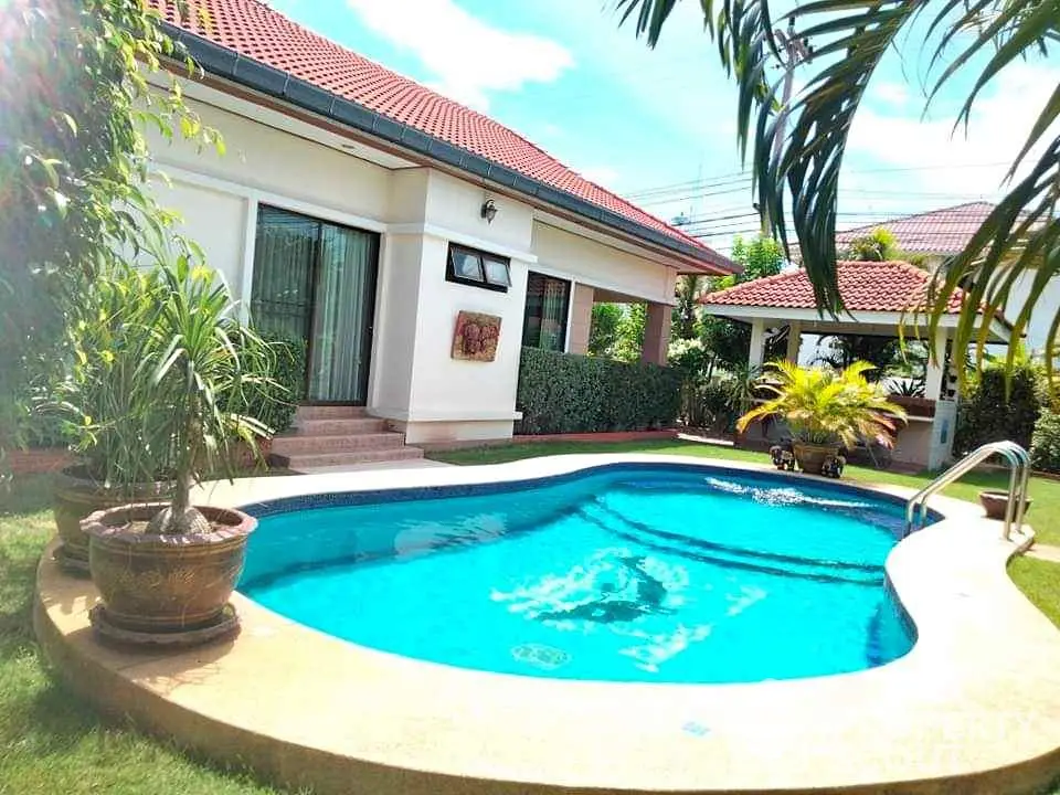 Charming villa with private pool and lush garden, perfect for relaxation and entertaining.