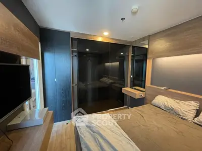 Modern bedroom with sleek design and built-in wardrobe