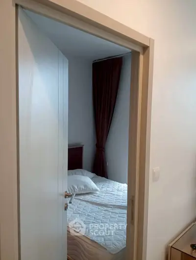 Cozy bedroom with modern decor and comfortable bed