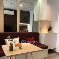 Modern living room with stylish seating and elegant decor