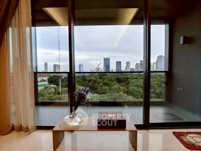 Luxurious living room with stunning city view and spacious balcony in modern apartment.