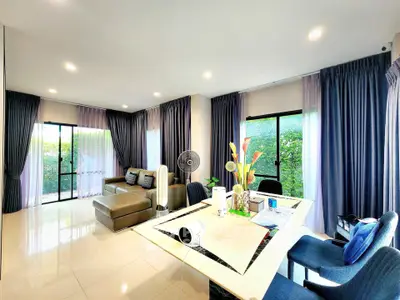 Spacious modern living room with elegant decor and natural light