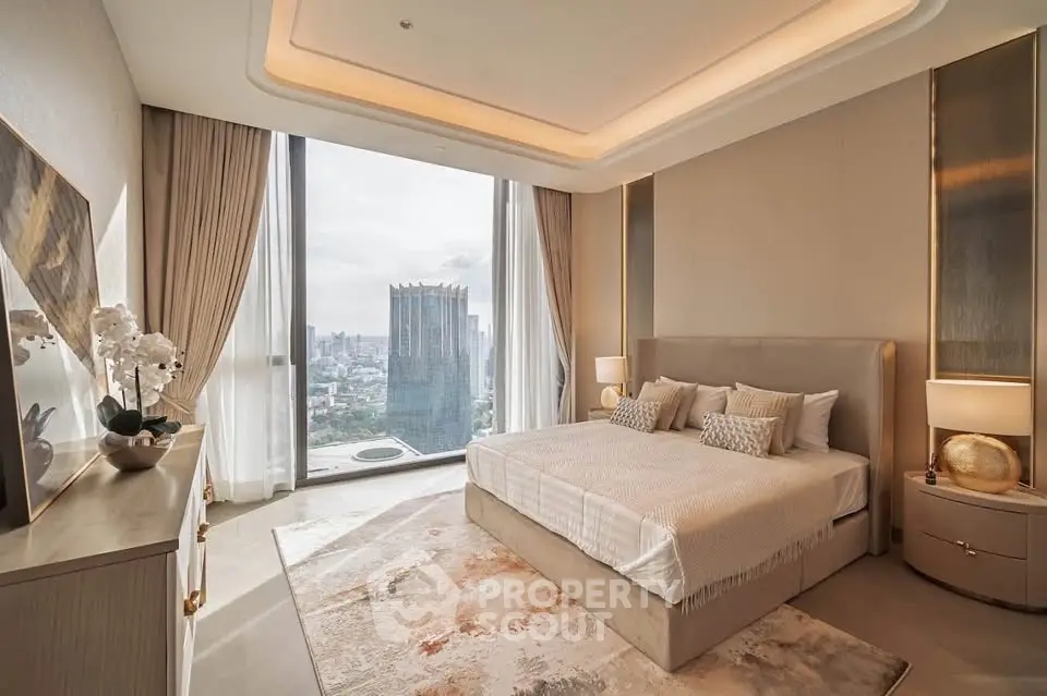 Luxurious bedroom with stunning city view and elegant decor