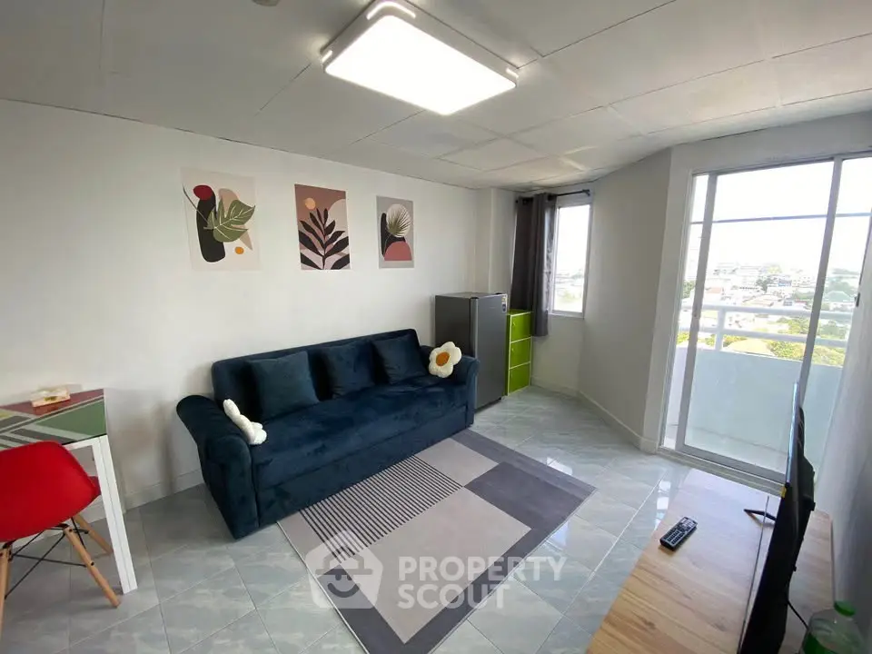 Bright living room with modern decor and large window view