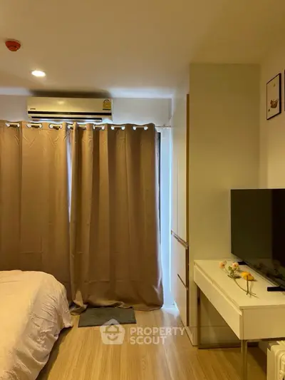 Cozy bedroom with modern decor and natural light