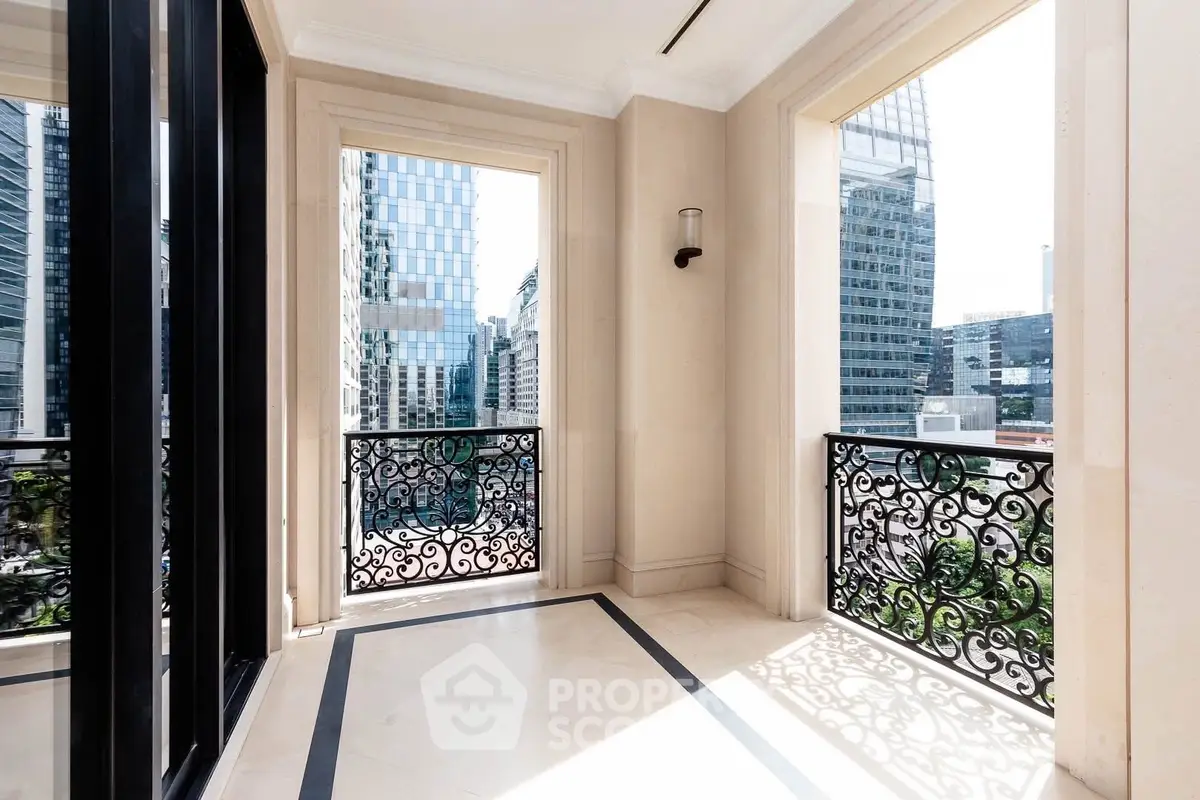 Luxurious balcony with ornate railings and cityscape views, perfect for urban living.