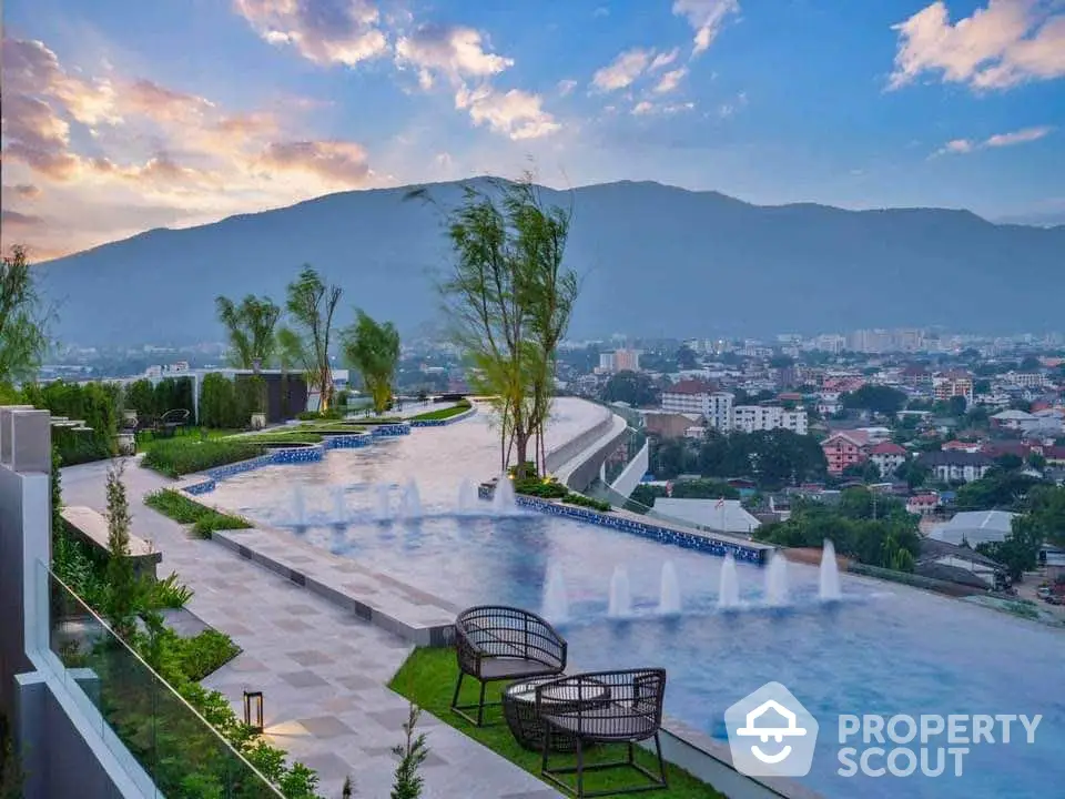 Stunning rooftop infinity pool with panoramic city and mountain views