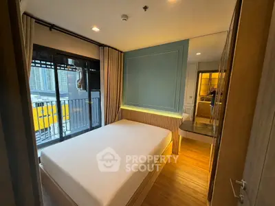 Modern bedroom with balcony access and stylish interior design