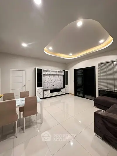 Modern living room with elegant ceiling design and stylish furniture