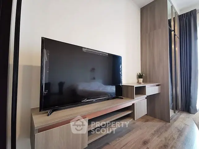 Modern living room with sleek TV unit and stylish decor
