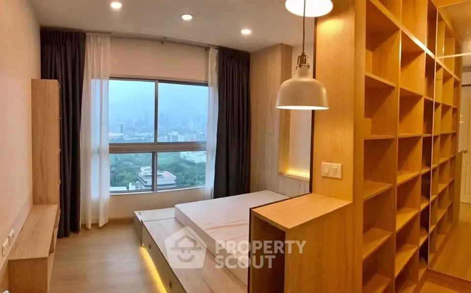 Modern bedroom with panoramic city view and stylish wooden shelving