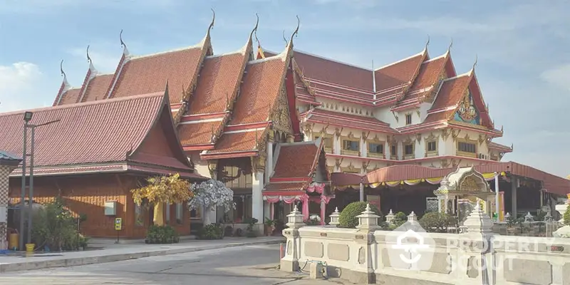 Stunning traditional Thai architecture with ornate roof design and vibrant colors.