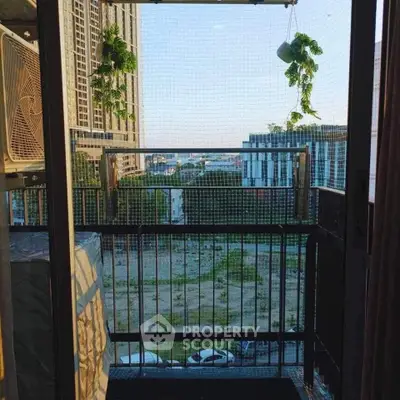 Charming balcony with city view, perfect for relaxing and enjoying the skyline.
