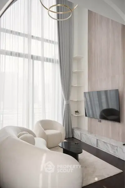 Luxurious modern living room with high ceilings and elegant decor