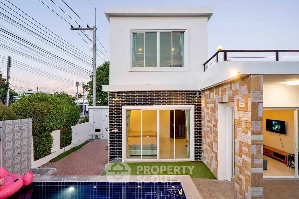 Modern two-story home with pool and stylish exterior design