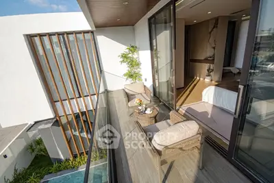 Luxurious modern balcony with elegant seating and stunning views, perfect for relaxation and entertaining.