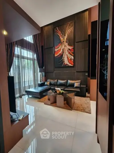 Luxurious modern living room with high ceilings and elegant decor