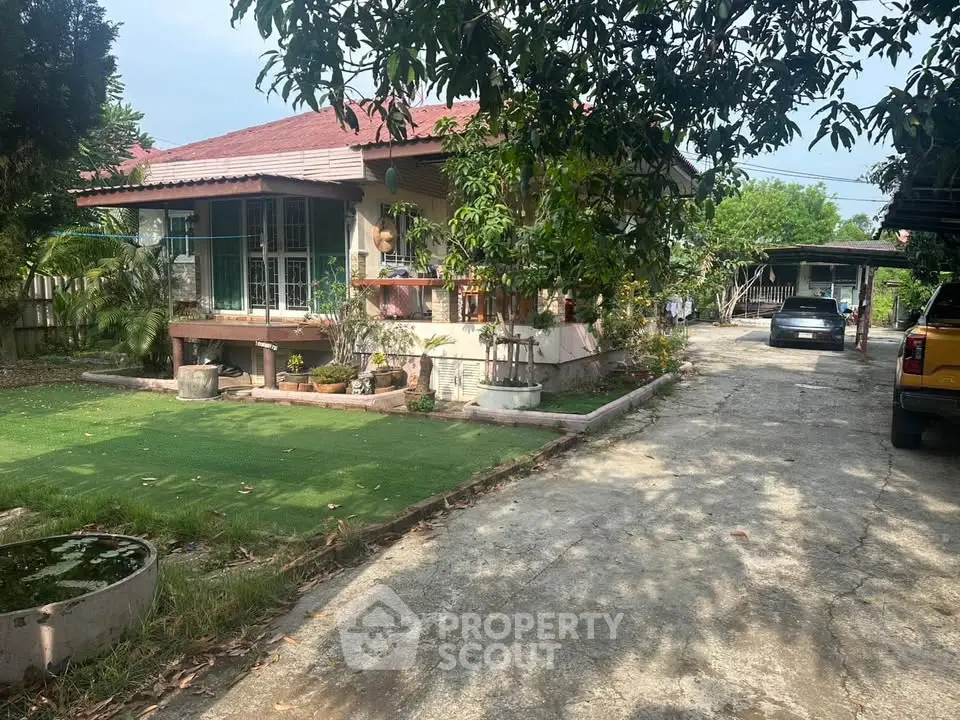 Charming single-story home with lush garden and spacious driveway